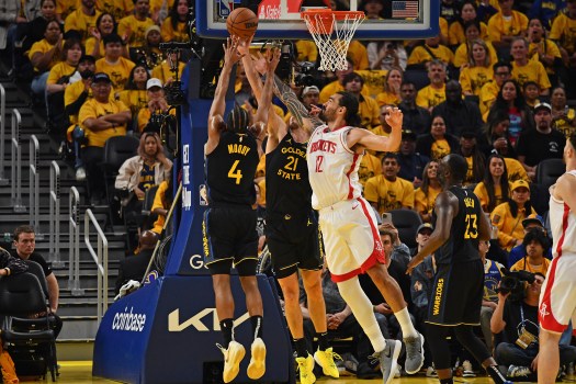 Houston Rockets fans cheering during a playoff game