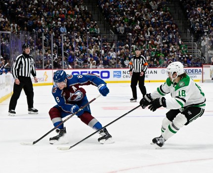 Cale Makar skating with the puck during the playoffs