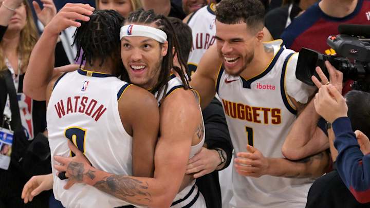 Aaron Gordon celebrates with his teammates after a key playoff win
