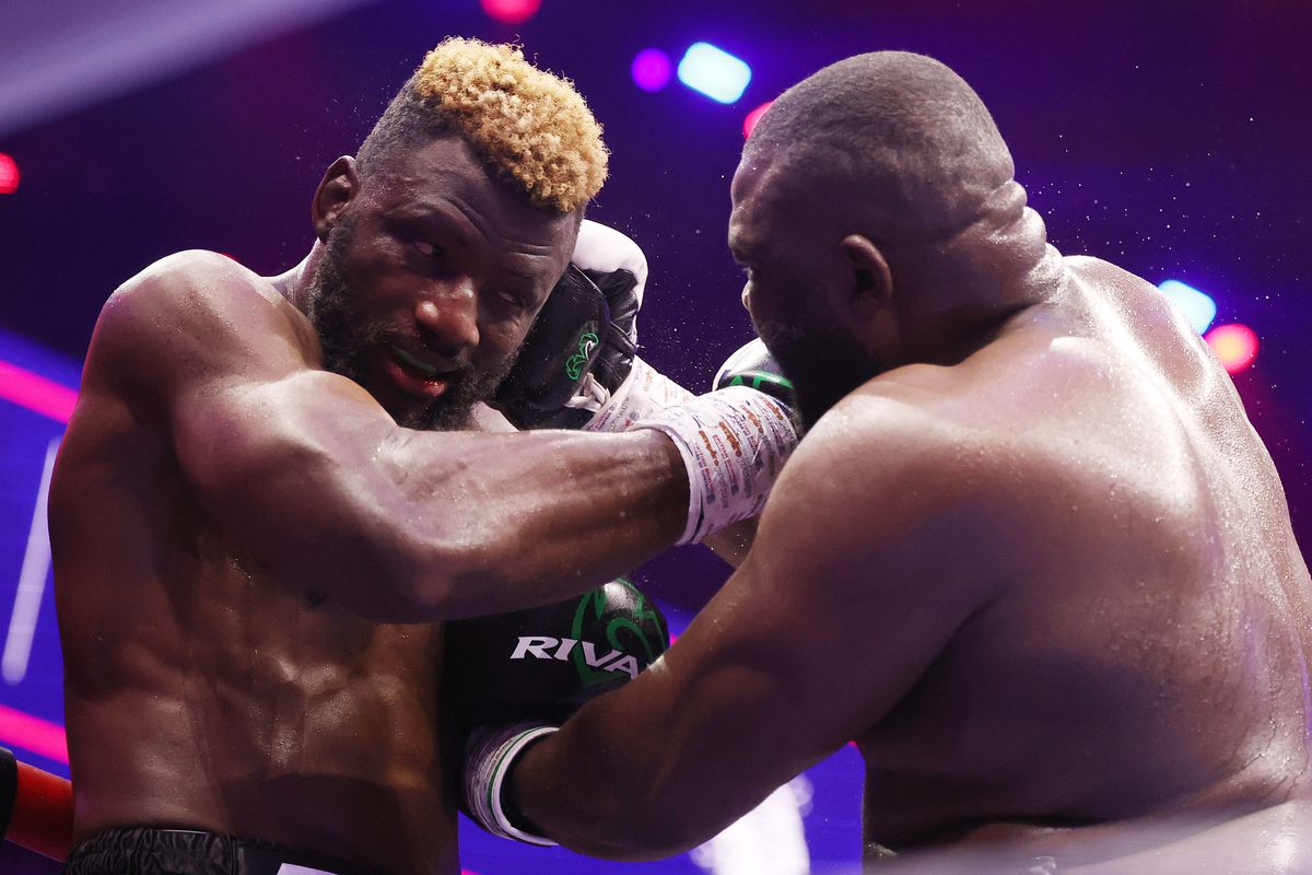 Martin Bakole throws a right hand during heavyweight bout, in action against Efe Ajagba