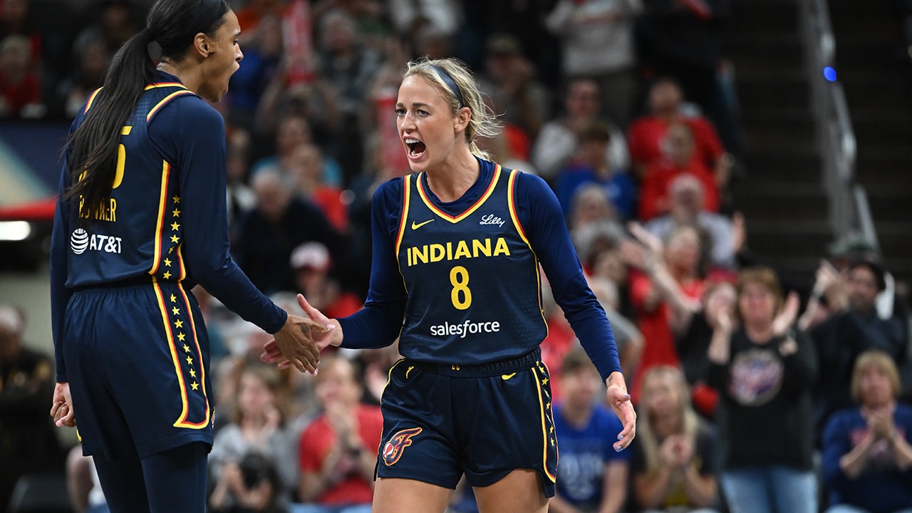 Kiki Iriafen battles for the rebound during a Washington Mystics preseason game
