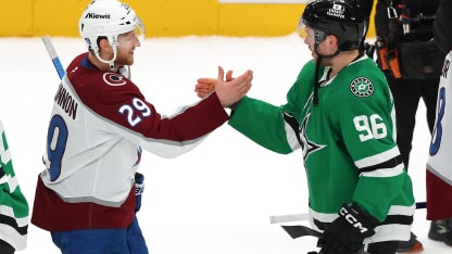 Colorado Avalanche players celebrate on the ice during Avs game tonight