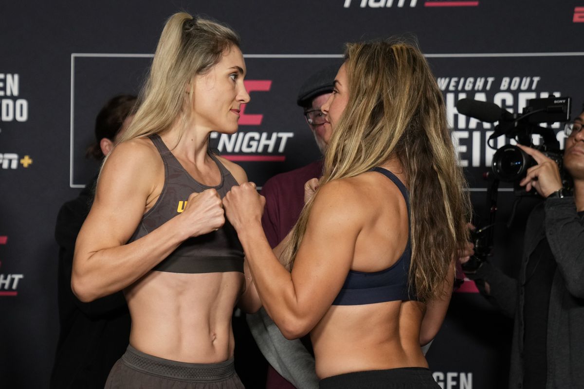 Miesha Tate focused before a UFC fight, demonstrating her championship mindset