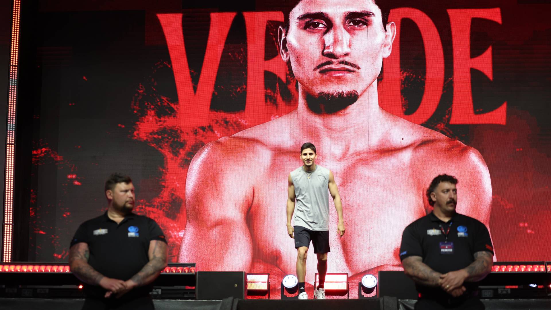 Marco Verde enters the ring for his professional debut, displaying his silver medal-winning form