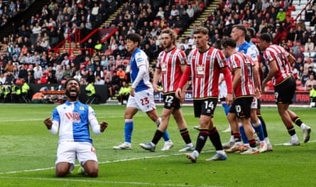 Leeds United lift the EFL Championship trophy