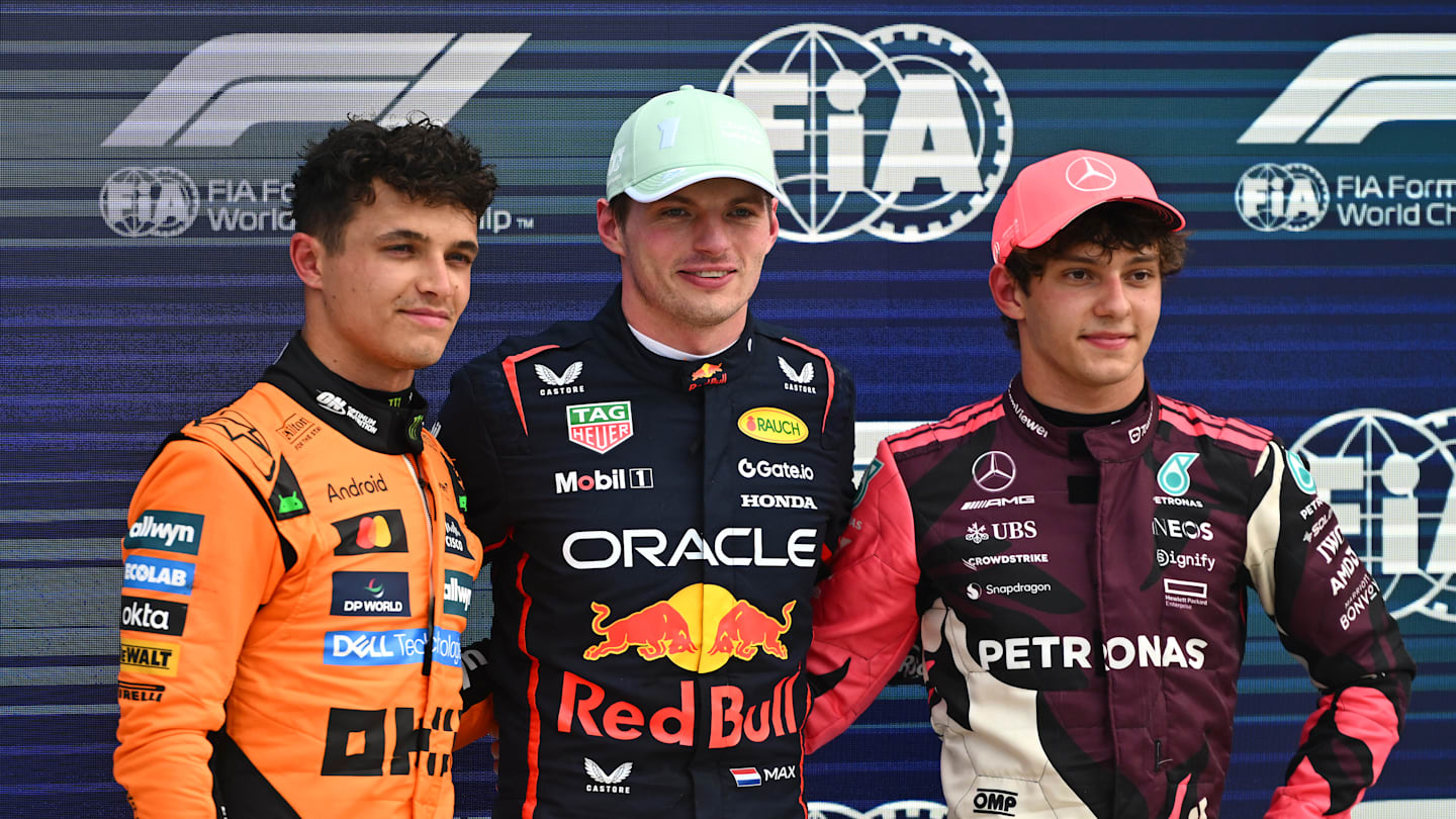 A panoramic shot of F1 cars racing at the Miami Grand Prix 2025