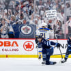 Scott Arniel coaching the Jets in a playoff game