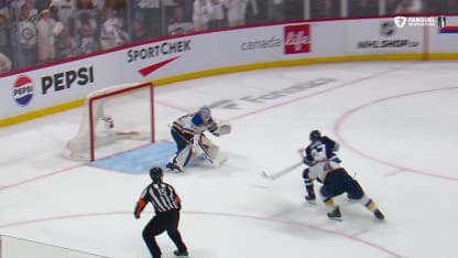 Jordan Binnington making a save for the St. Louis Blues