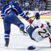 A thrilling NHL playoff moment with players competing for the puck