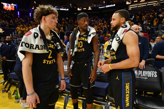 Steph Curry celebrates on the court, representing excellence through the years