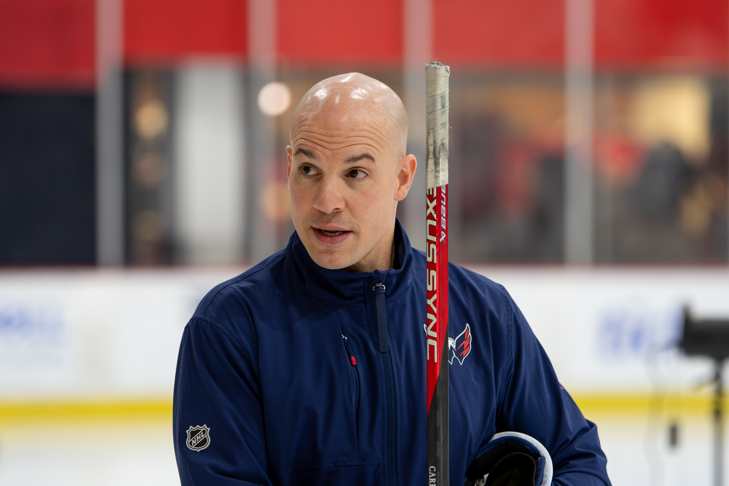 Scott Arniel celebrates behind the Winnipeg Jets bench, leading the team to success