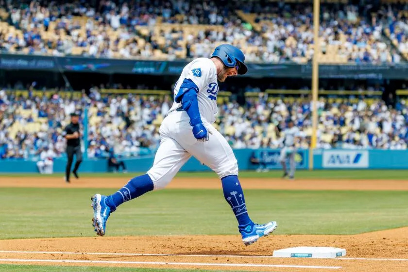 Freddie Freeman celebrates after a big play for the Dodgers