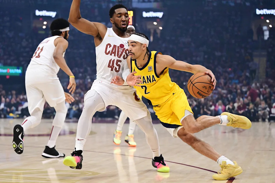 Andrew Nembhard in action during the NBA Playoffs, exemplifying his two-way impact for the Indiana Pacers