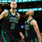 Boston Celtics roster players focusing on strategy during a timeout