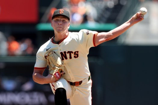 Kyle Harrison pitching for the Giants