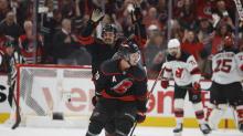 Sebastian Aho with Carolina Hurricanes jersey on the ice