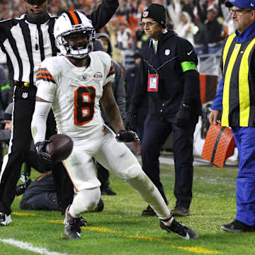 Shawne Merriman celebrates on the field