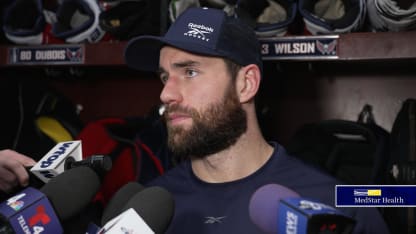 Aliaksei Protas celebrates on the ice after scoring a crucial playoff goal for the Washington Capitals.