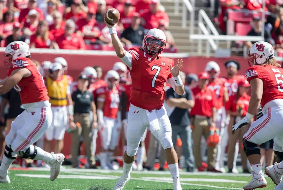 Cam Rising celebrates a touchdown for the Utah Utes