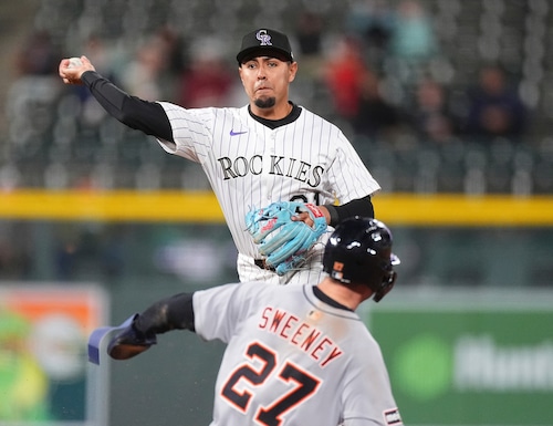 Detroit Tigers players in action during a recent game.