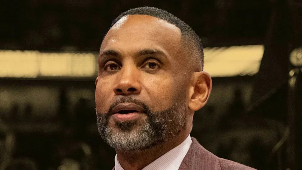 Grant Hill playing for the Detroit Pistons