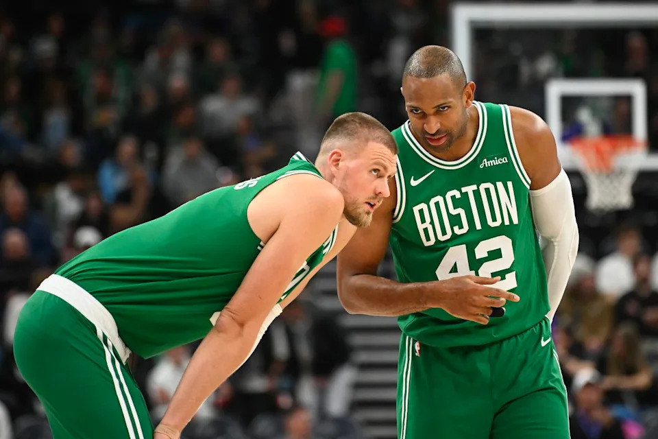 Al Horford celebrates on the court, exemplifying veteran leadership for the Boston Celtics.