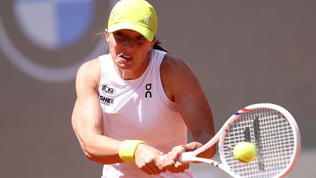 Iga Swiatek celebrates a win at the Italian Open