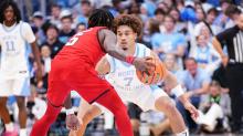 College basketball players in action during basketball games today