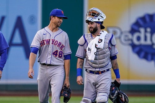 Jacob deGrom pitching for the Texas Rangers, focusing on his intensity and skill