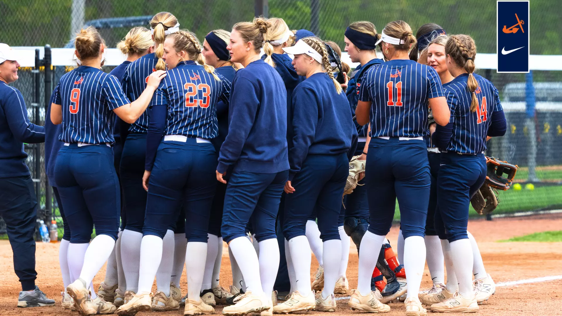 Trine softball players in action during the MIAA Tournament