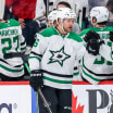 Auston Matthews celebrating with Toronto Maple Leafs teammates after a playoff victory