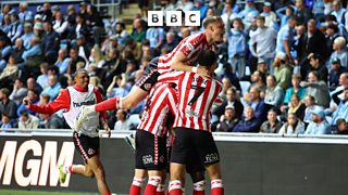 Sunderland fans and players celebrate their late winner over Coventry