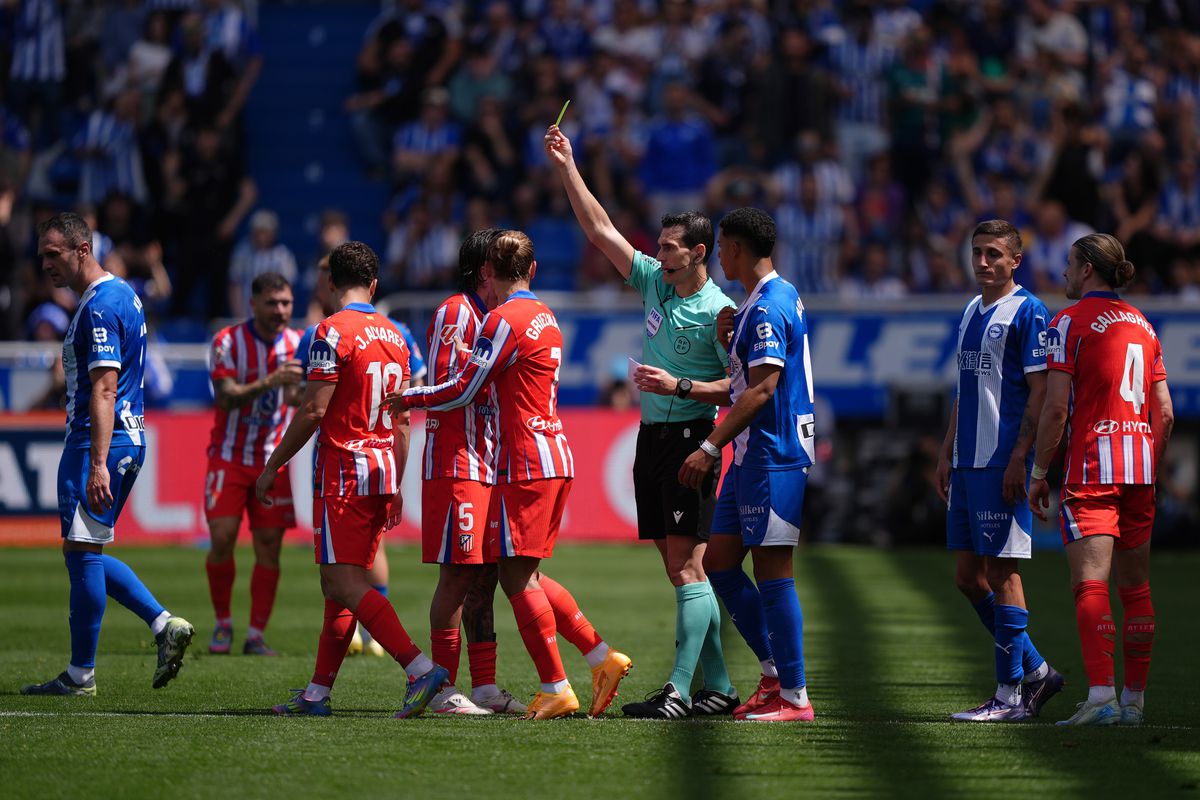 Atletico Madrid squad warming up before a La Liga match