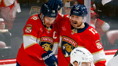 Connor McMichael in action during an NHL playoff game, showcasing dynamic offensive play