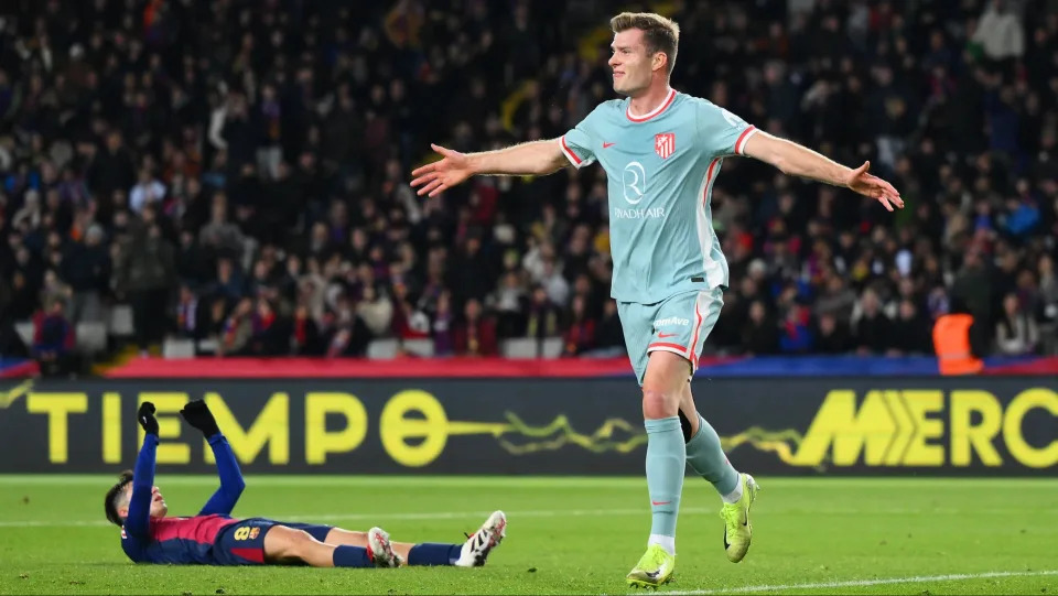 Alexander Sørloth celebrates after scoring for Atlético Madrid