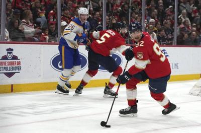 Tomas Nosek controls the puck during a high-stakes NHL playoff game