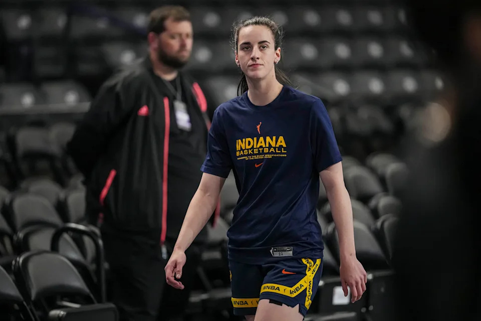 Caitlin Clark drives the ball in the Fever vs Dream WNBA preseason matchup