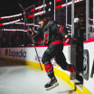 Capitals vs Hurricanes playoff action, players face off in Game 3