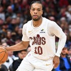 Darius Garland driving to the basket in Cavaliers uniform