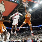 Cooper Flagg taking a jump shot during a game.