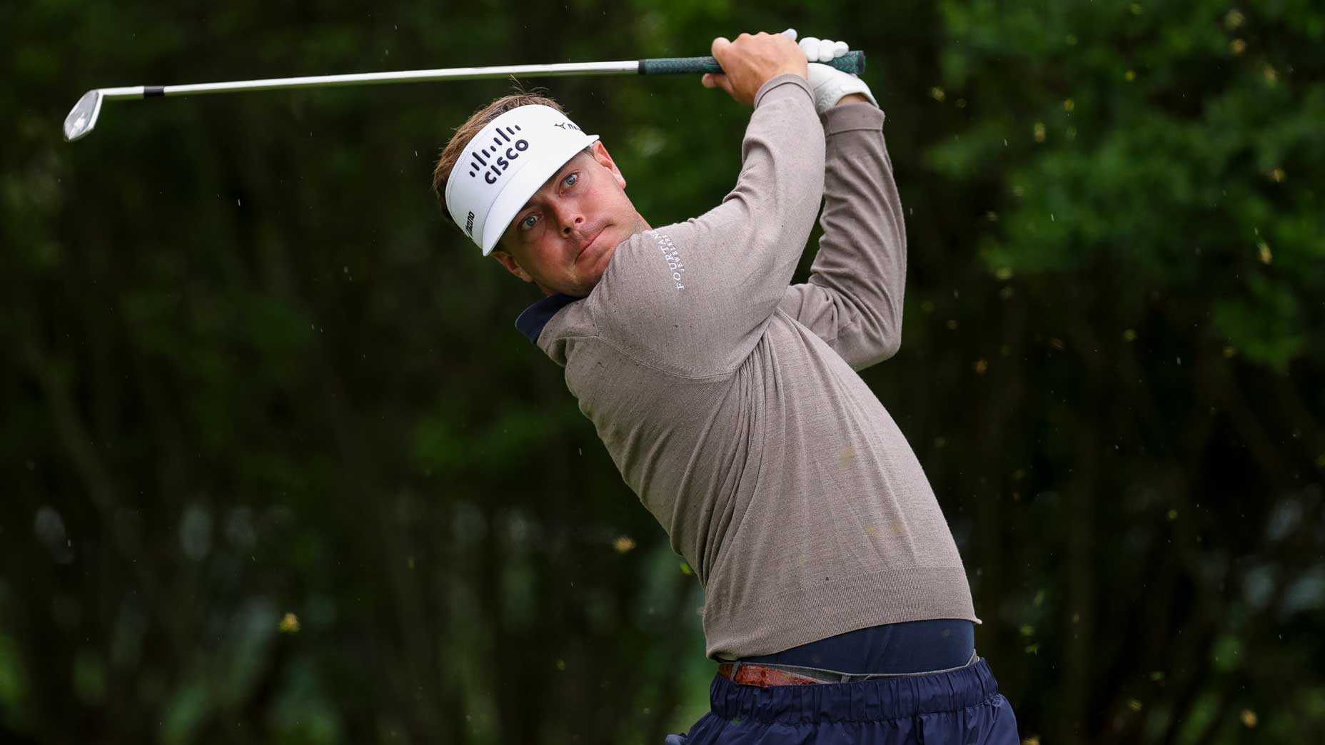 Players compete in the 2025 Truist golf tournament at Philadelphia Cricket Club