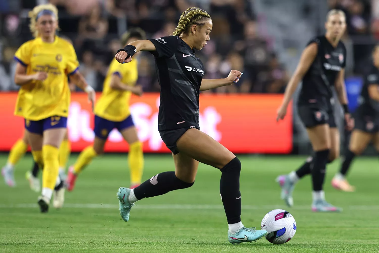Savy King of Angel City FC receives medical attention during an NWSL match against Utah Royals.