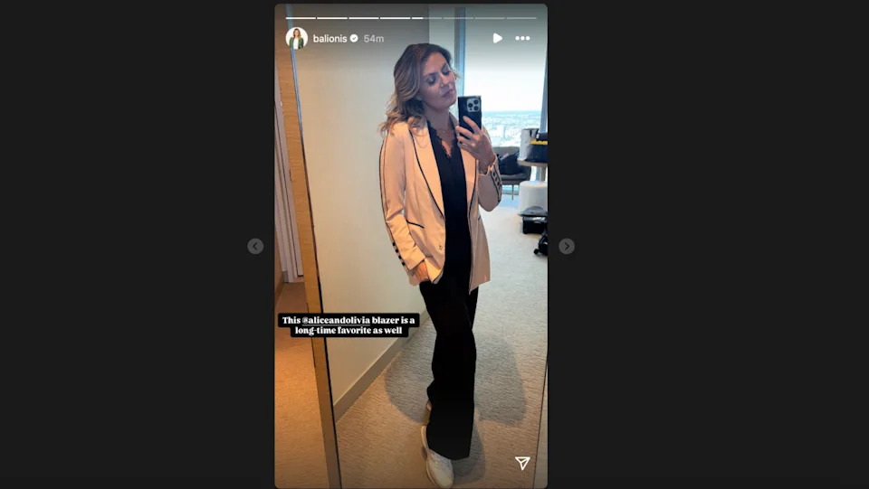 Amanda Balionis reporting at a golf event
