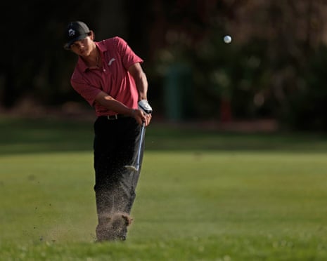Tiger Woods and his son Charlie during a golf event