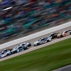 Aerial view of Kansas Speedway packed with fans and cars