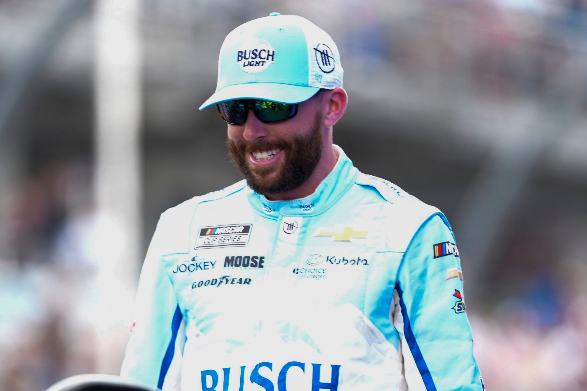 Ross Chastain preparing for a NASCAR race, focused and determined