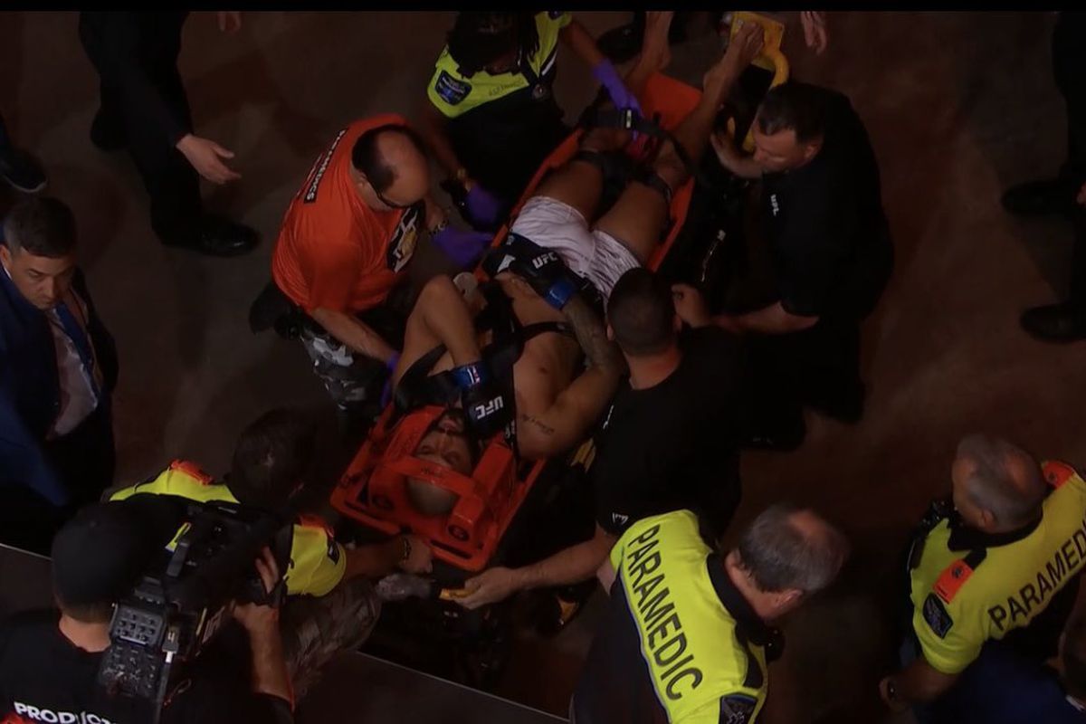 Marc-André Barriault celebrates in the octagon after his UFC 315 win