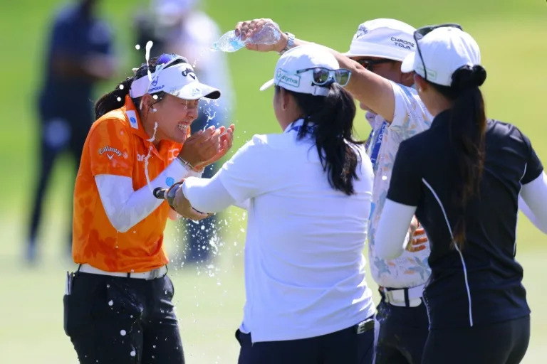 Jeeno Thitikul celebrates after winning the Mizuho Americas Open at Liberty National