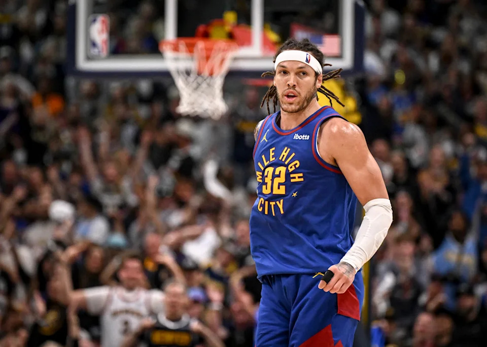 Denver Nuggets celebrate a clutch playoff win against Thunder, NBA playoffs action.