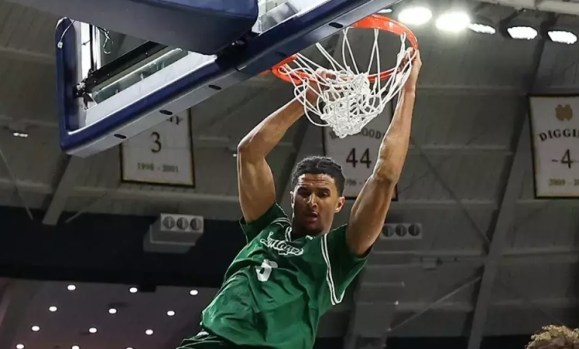 Dwayne Koroma in action for Le Moyne, now joining UConn Huskies